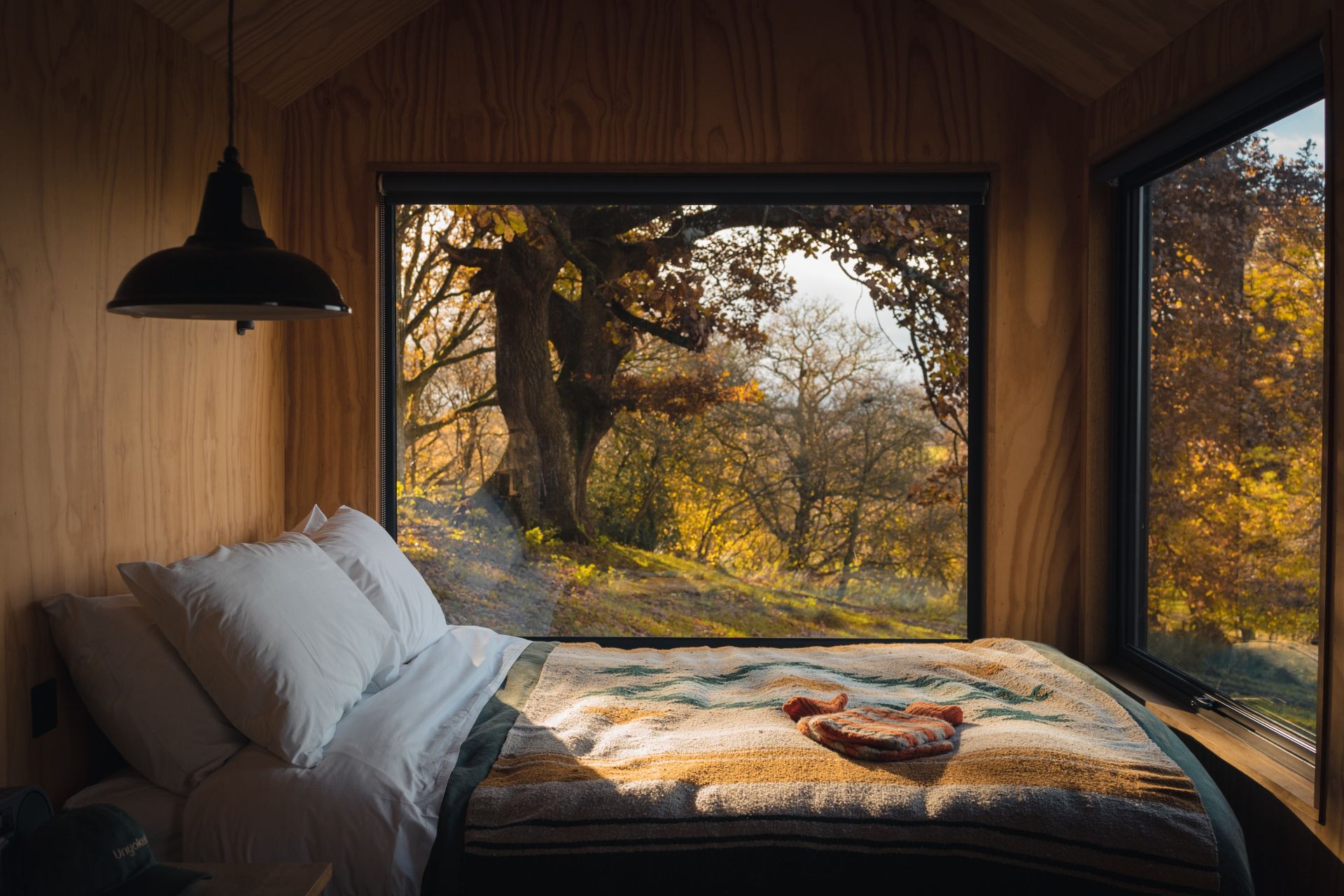The bed in the Unyoked cabin