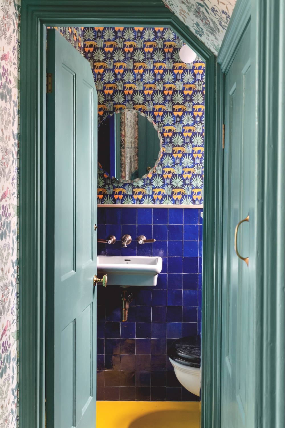 Drummonds wallpapered bathroom