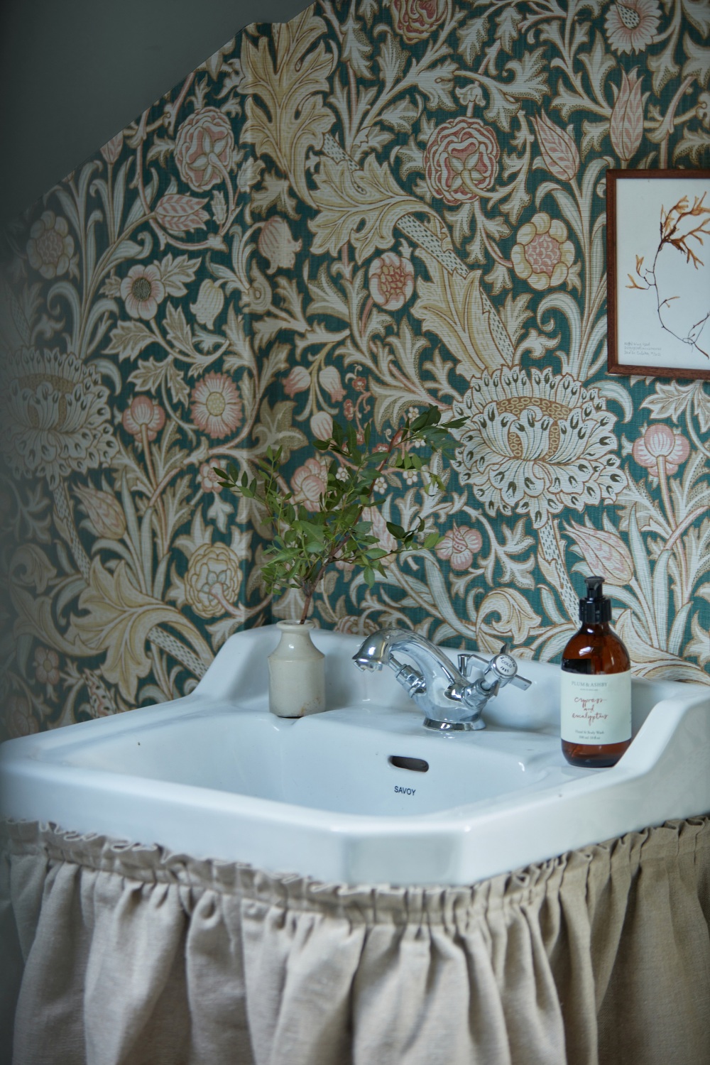 Morris & Co wallpaper behind sink