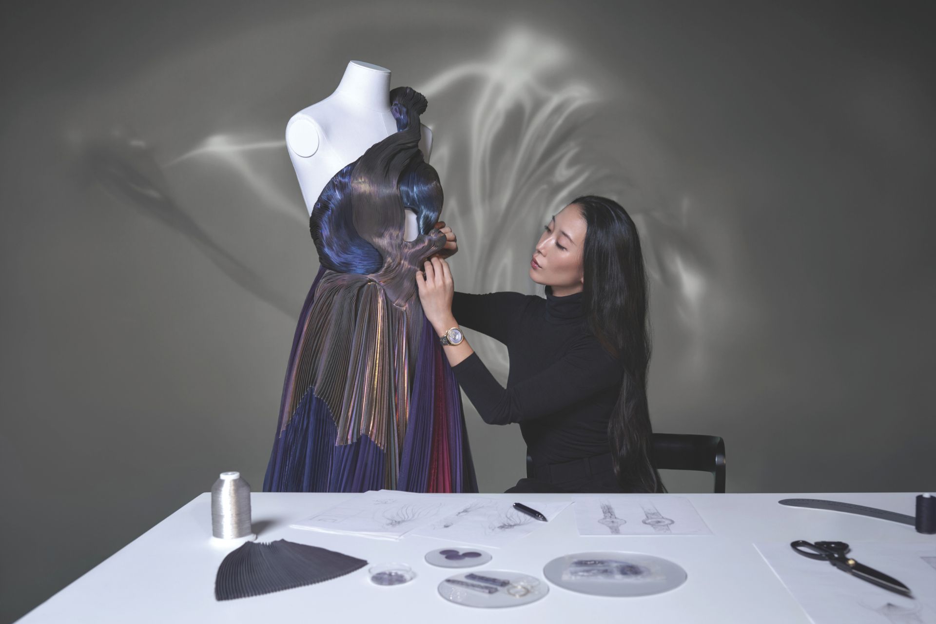 YiqingYin with the dress that inspired Vacheron Constantin’s Égérie Pleats of Time concept watch